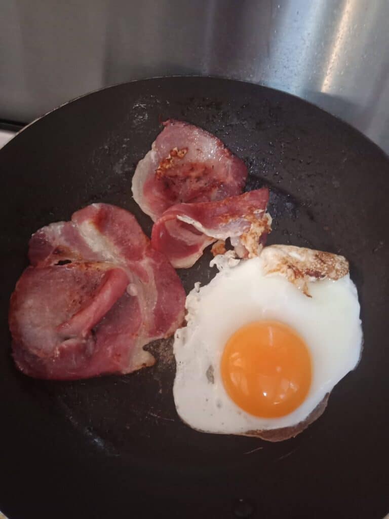 Breakfast cook up of bacon and eggs in a cross country road trip while practicing some Aussie slang